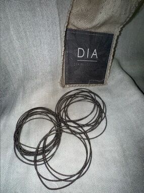 24 Women's Dia Wire Bracelet Set Missing one from set. 7” before stretch